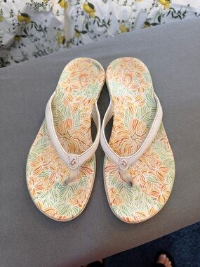 OluKai Women's Floral Flip Flops in Cream, Orange, Green